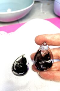 Holding a resin piece that is sticky after curing