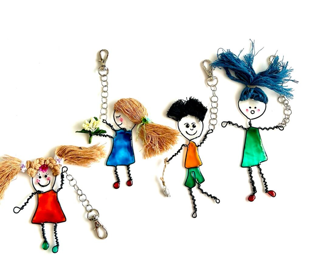 Mary-Anne Collection of handmade character bag charms made with wire, resin and cotton yarn - collectible characters and keepsakes