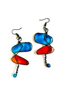 abstract style earrings made with wire and resin blue and red on earring hooks 